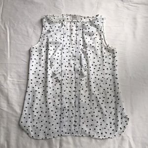 Two light sleeveless blouses